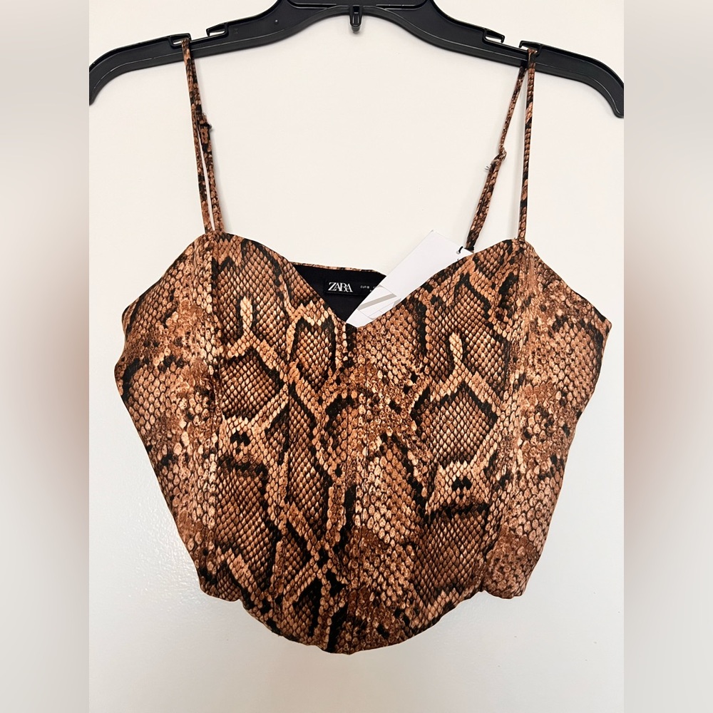 Cropped top. Size small. New with tags. Original price $35.90..